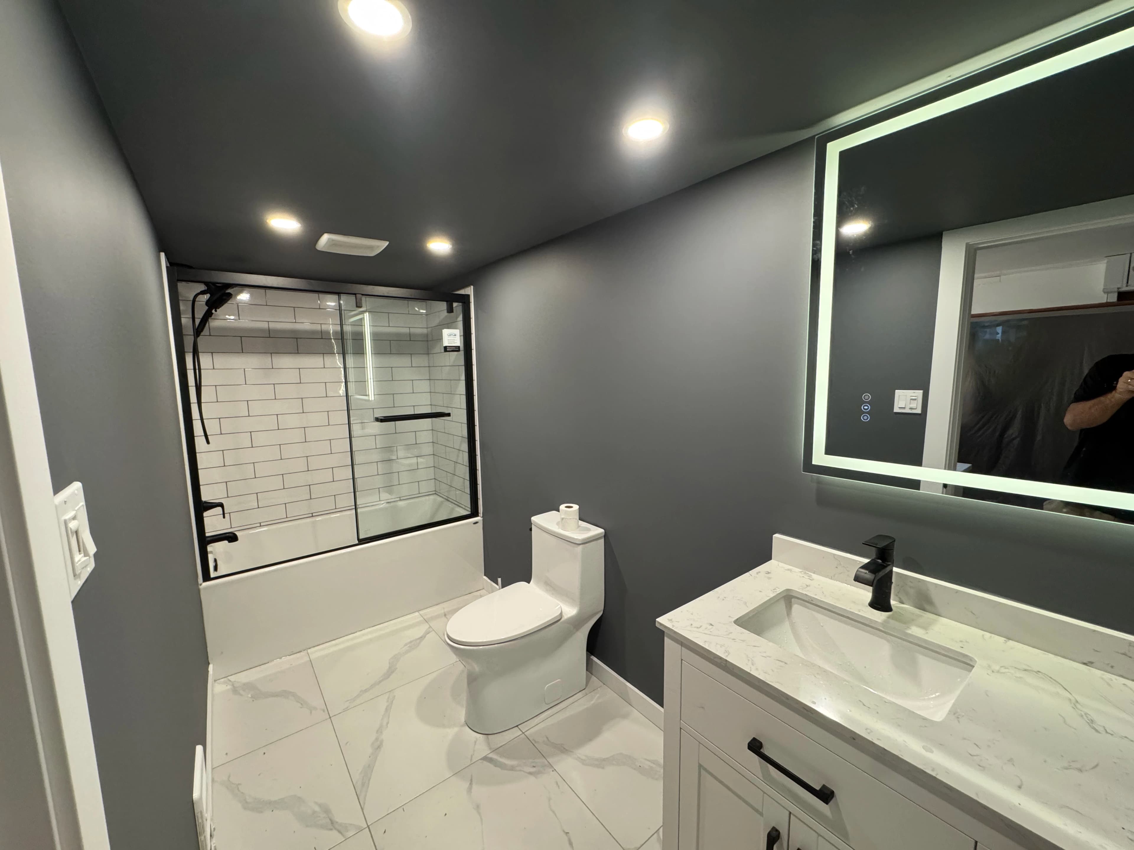 Dark Gray Kitchen And Bath by CVR Construction