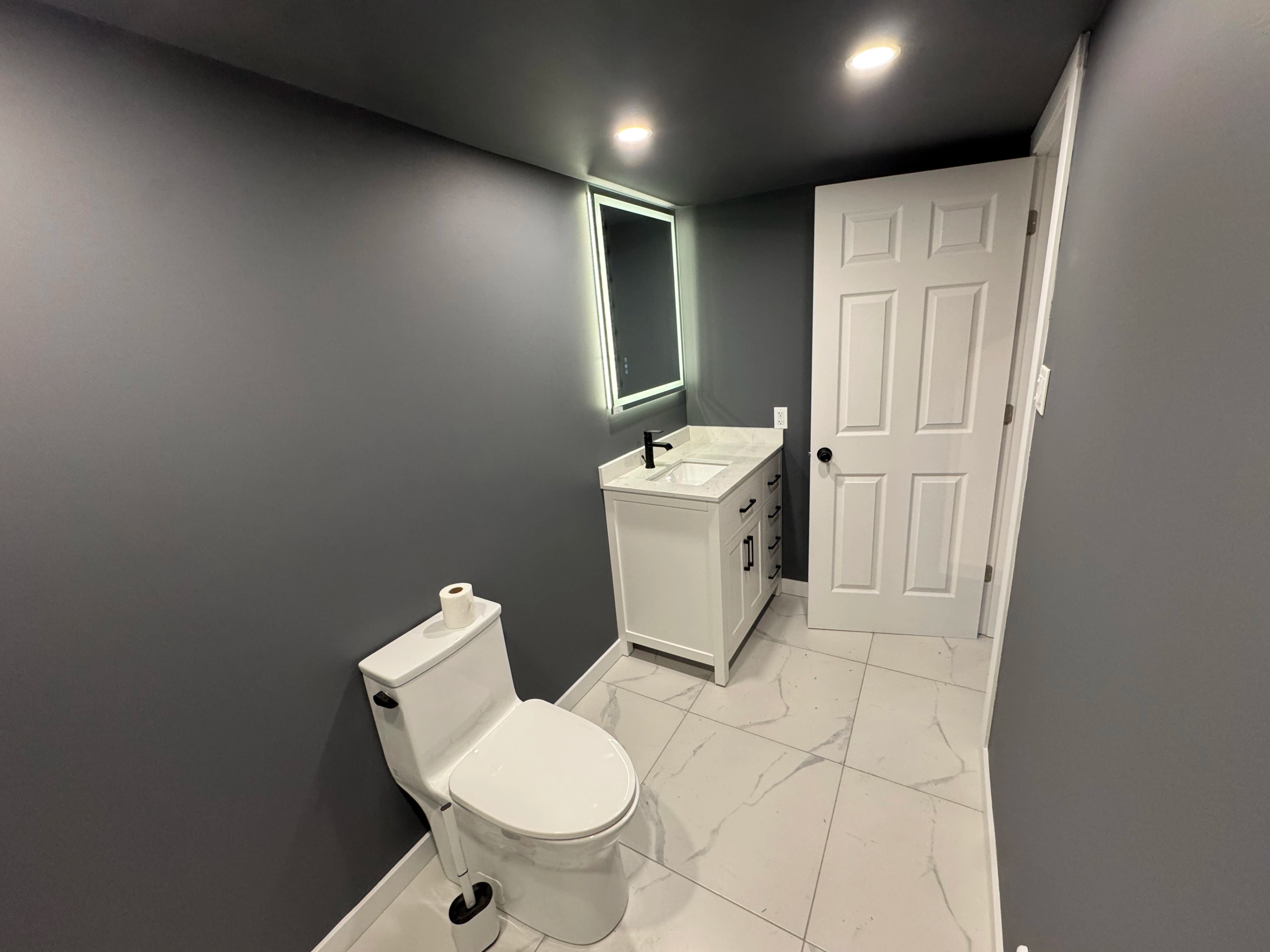 dark gray kitchen and bath by CVR Construction