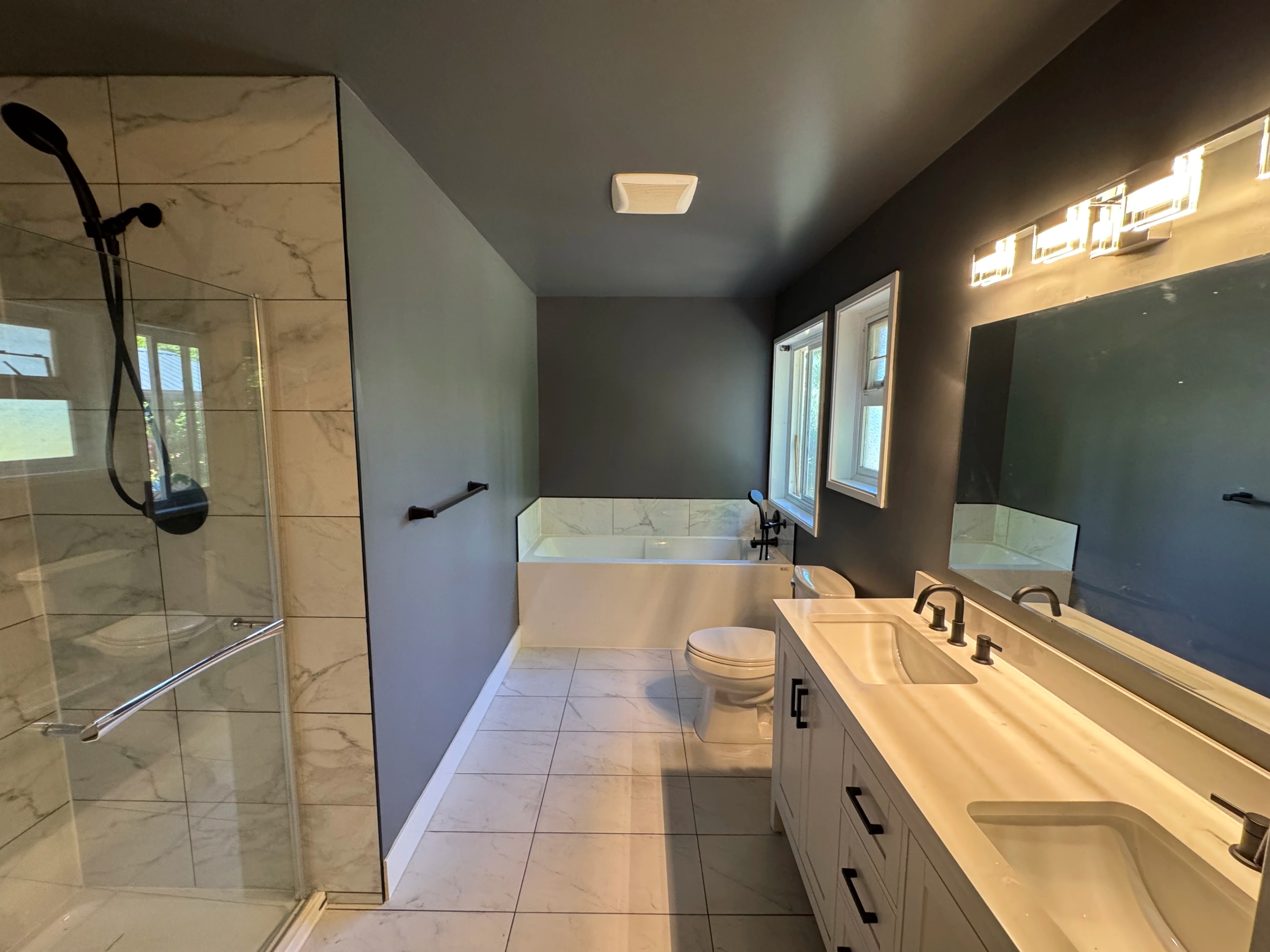 modern bath and laundry suite by CVR Construction