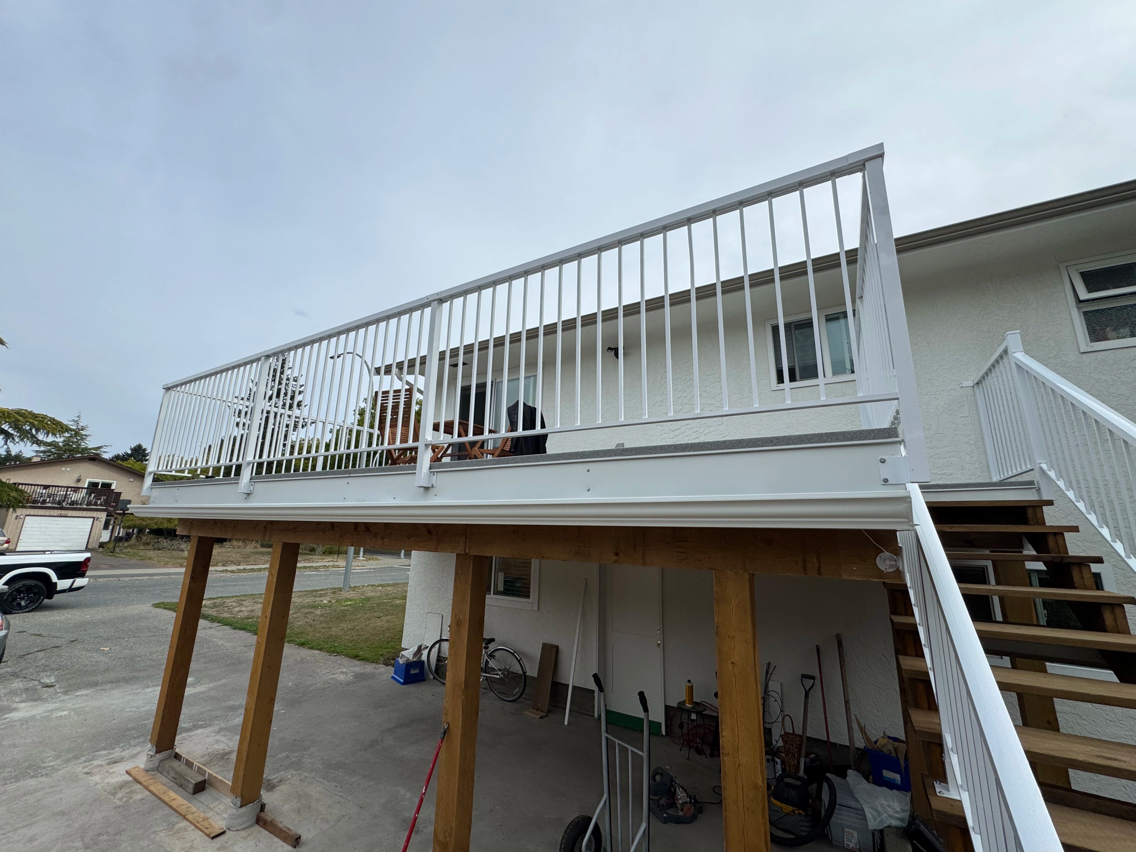 white railing deck by CVR Construction
